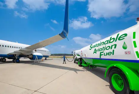 Photo of Sustainable Aviation Fuel truck loading fuel onto an airplane